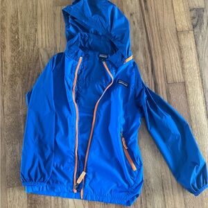 Patagonia Navy Jacket with Bright Orange Details